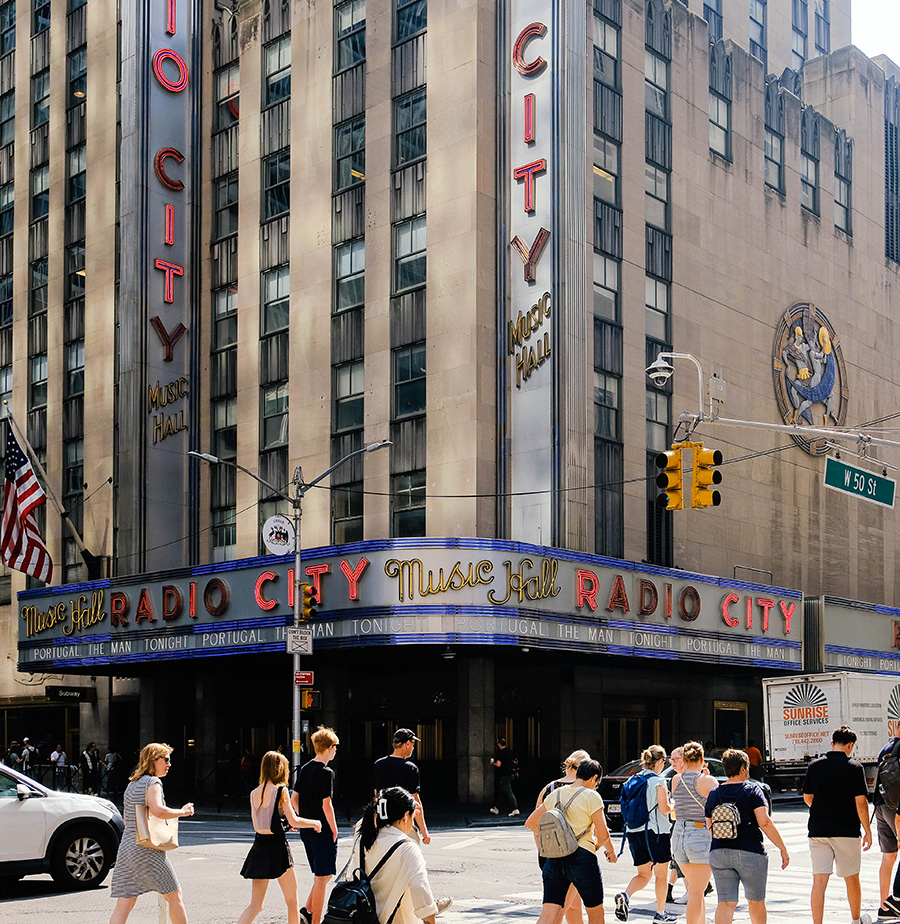 Sidewalk view of Radio City in Midtown New York City