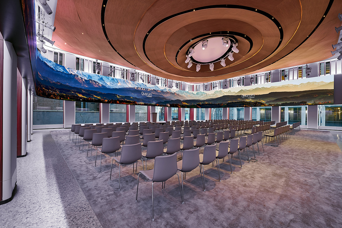 A grand 360 degree auditorium with professional lighting